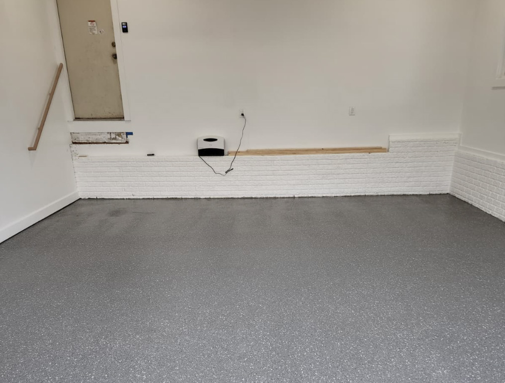 Garage floor after epoxy coating with seamless durable and crack-free finish