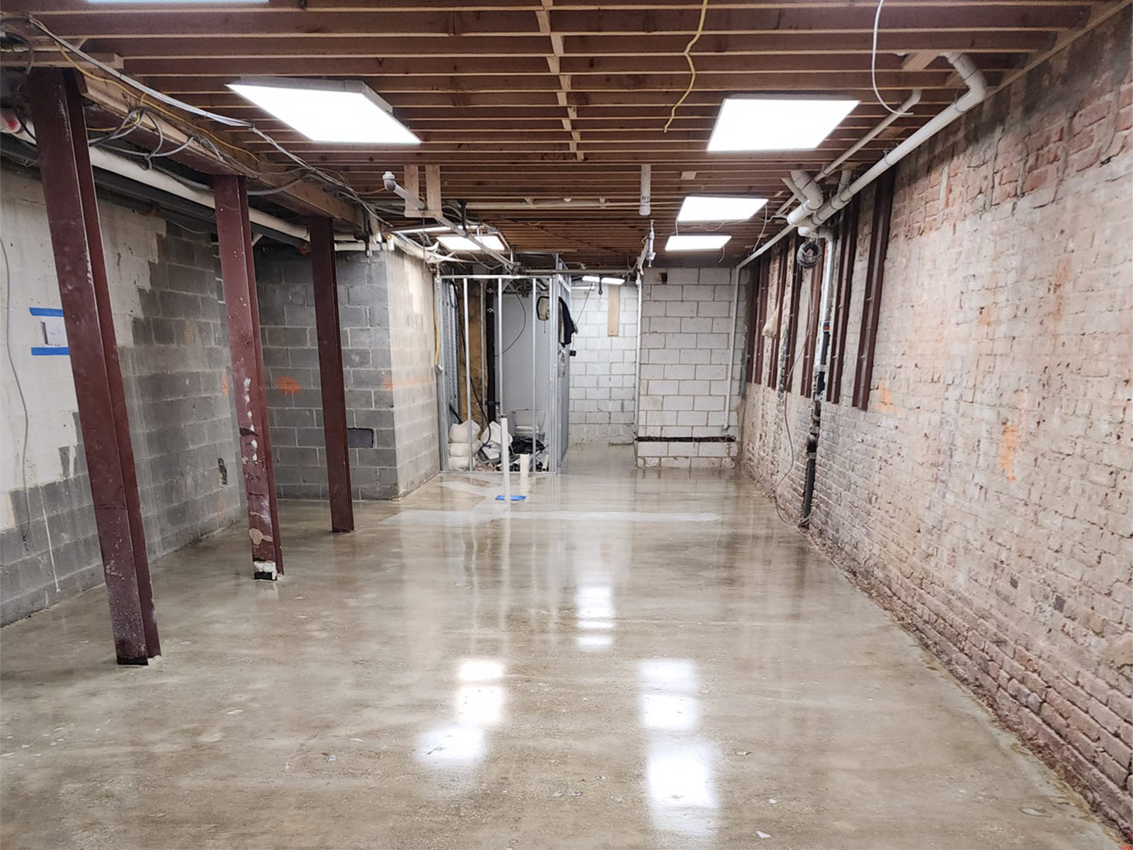 Garage floor after epoxy coating with bright smooth and durable finish